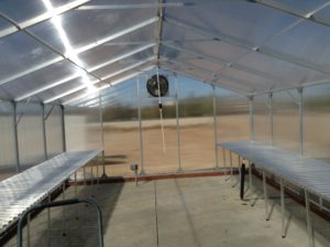 Interior of our aluminum climate controlled greenhouse kit.